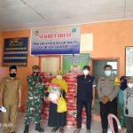 Bhabinkamtibmas dan Bhabinsa Desa Buakkang Laksanakan Pengawasan dan Pengawalan Penyaluran Bansos