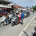 Sambut HUT RI Ke-76, Kaperwil Sulbar Lensa-rakyat.com bagi-bagi Masker dan Stiker HUT RI Ke-76