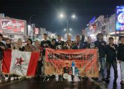 Di Tengah Hujan GMNI Kendari Gelar Aksi, Respon Kebijakan Pemerintah Pusat