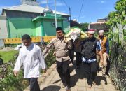 Bhabinkamtibmas Katimbang Kawal Iring-Iringan Jenazah Warga Binaan hingga ke Pemakaman
